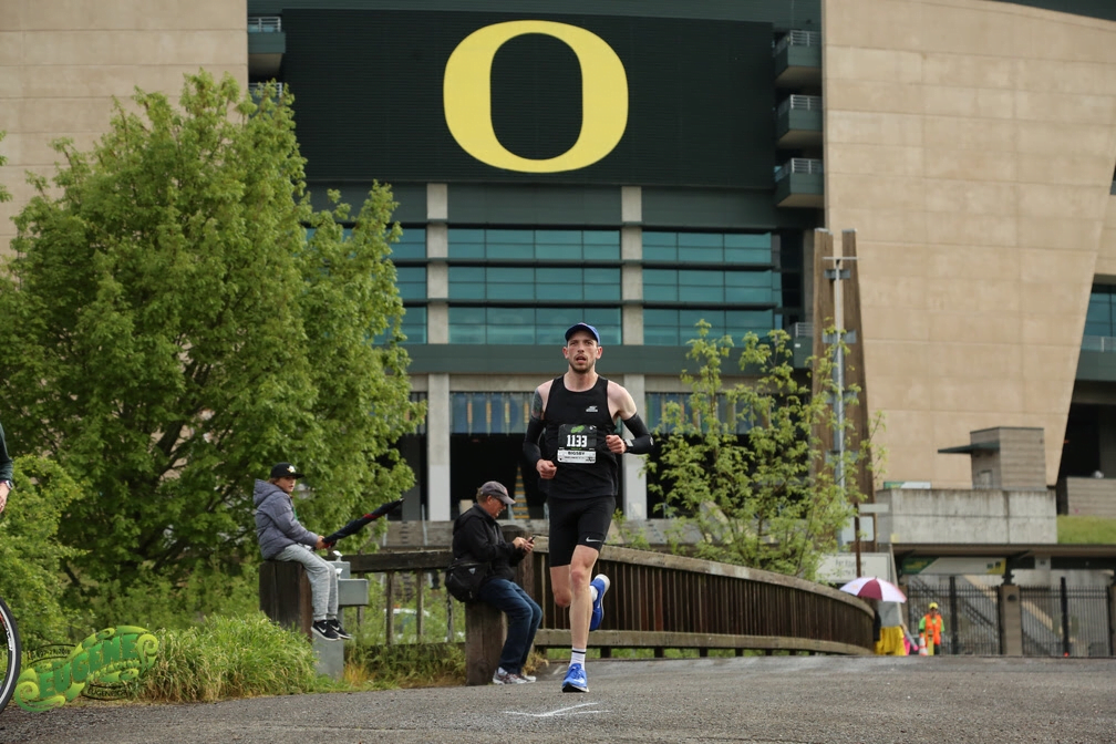 eugene running coach
