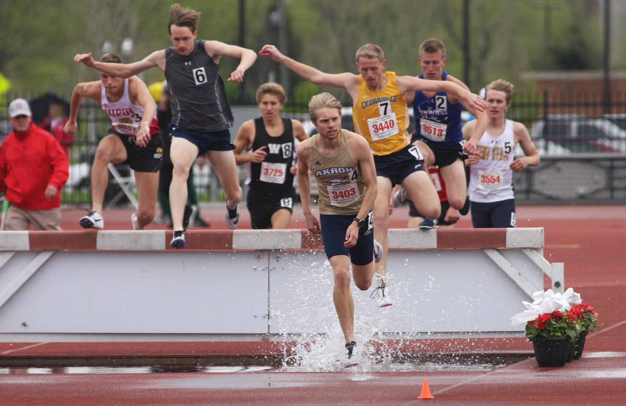 akron running coach