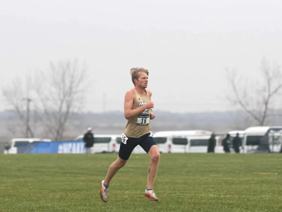 akron running coach nick striclen