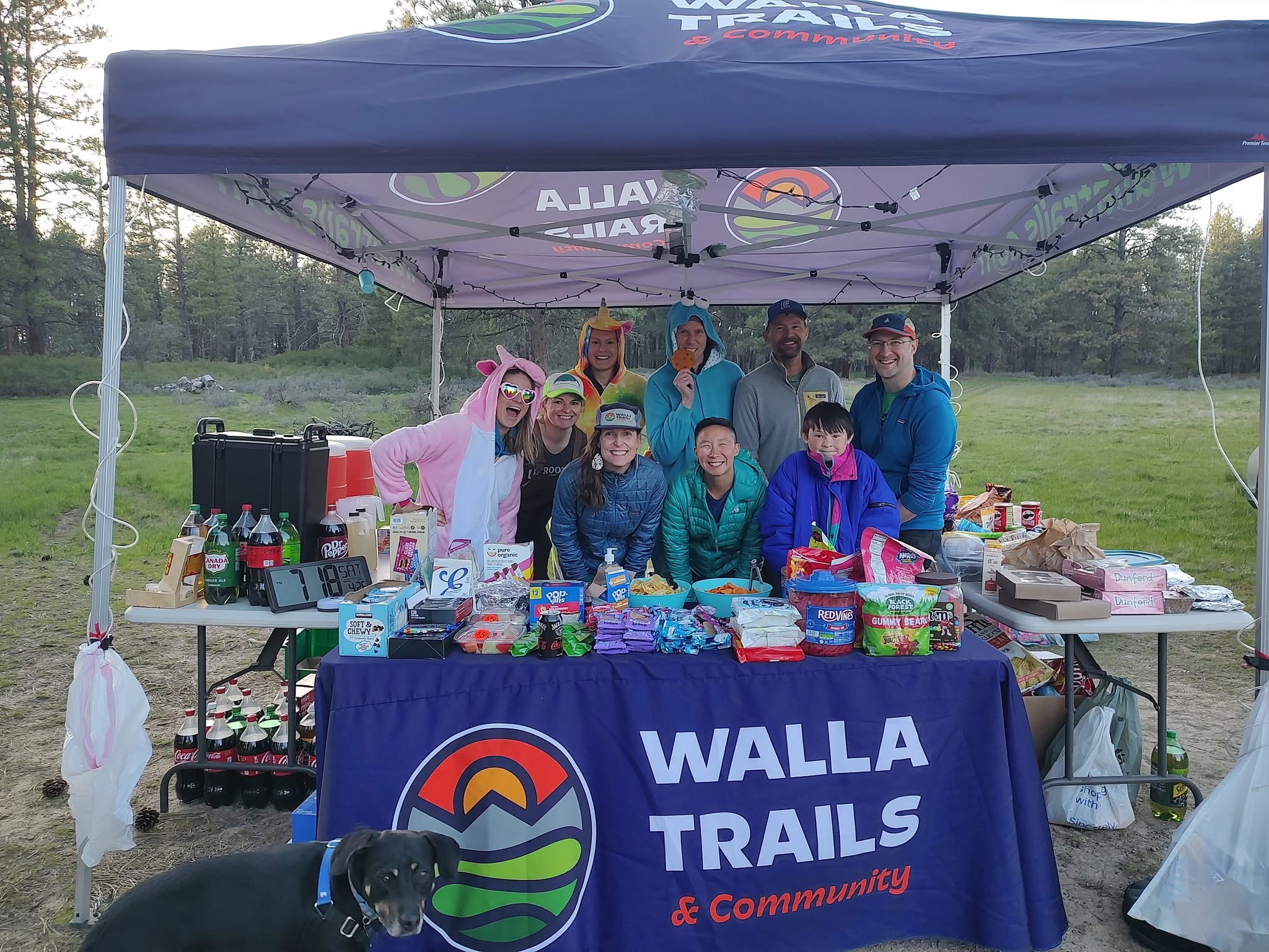 A race aid station stocked with snacks, drinks, volunteers in costume and more! 