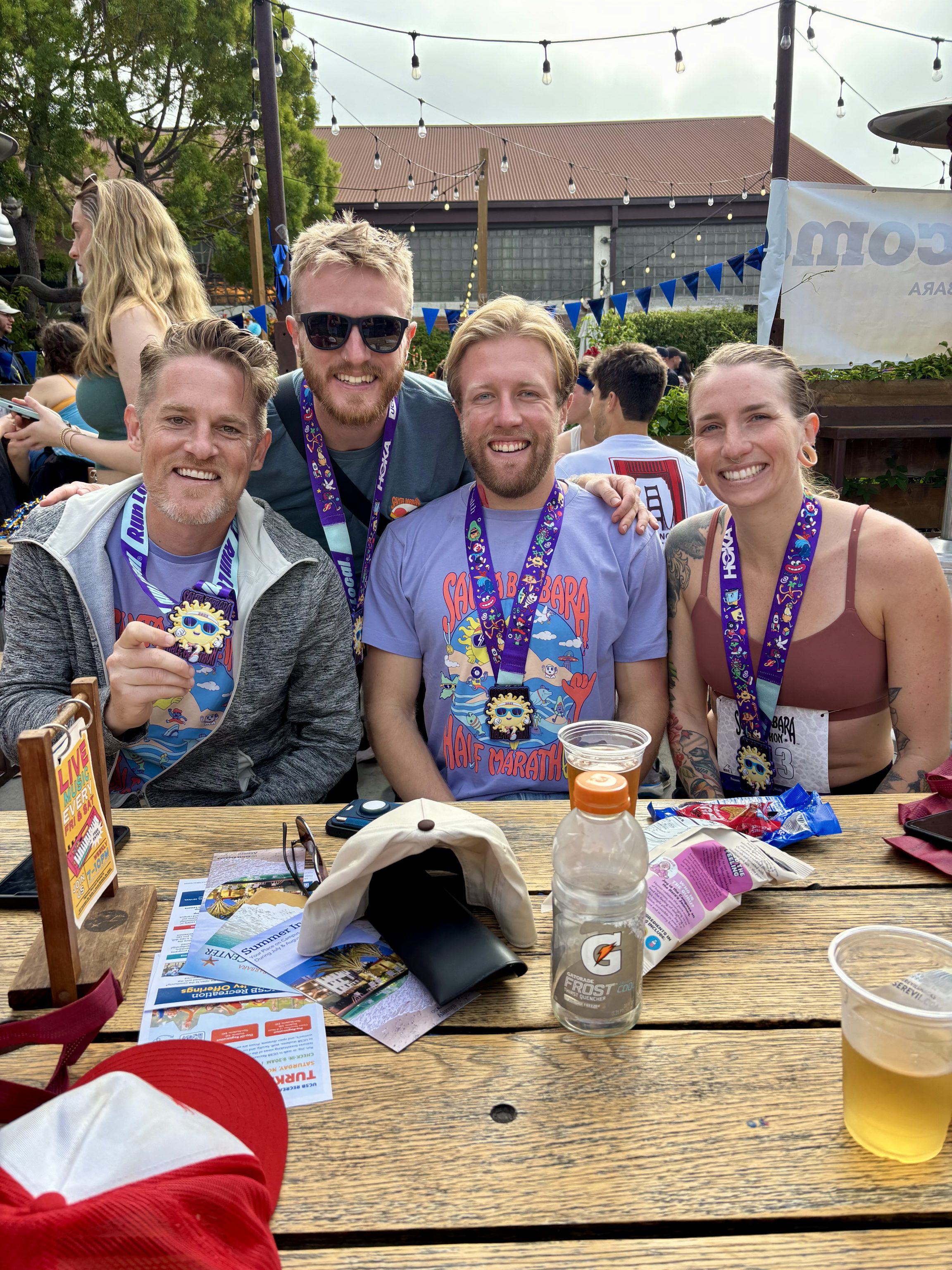 TRR Coach Evan and his athletes celebrating in the "Funk Zone" after the Santa Barbara Half Marathon.